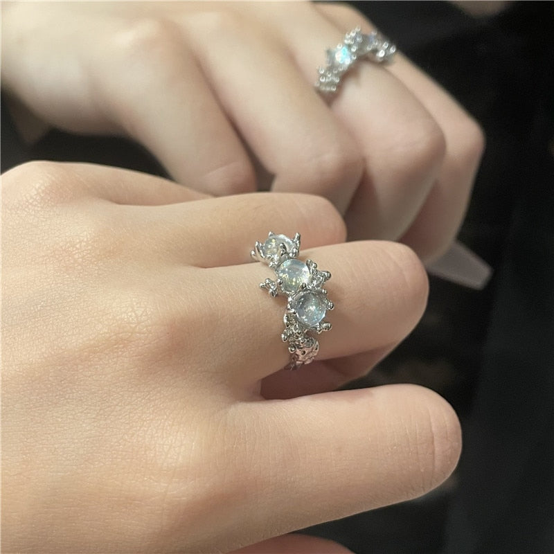 Radiant Crystal Opal Star Open Rings